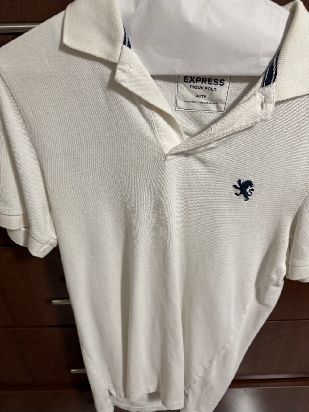 Express Men's White Polo with Navy Crest